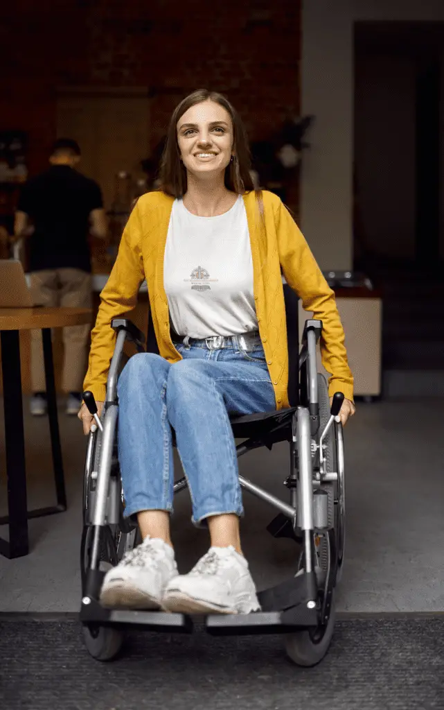 About Us t shirt mockup of a happy young woman using a wheelchair m18478 r el2